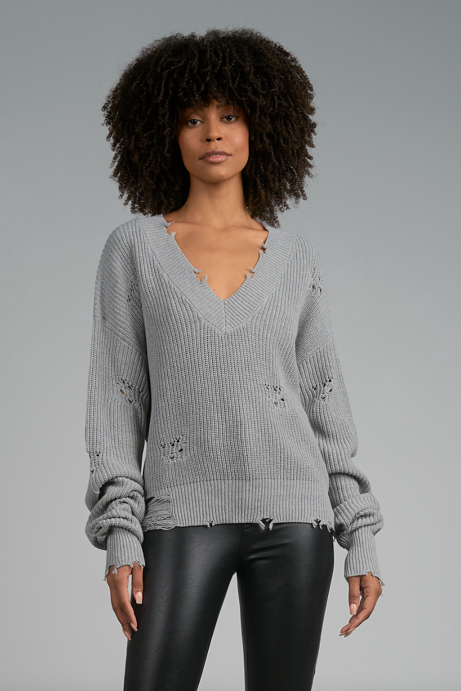 SUETER GRIS RASGADO